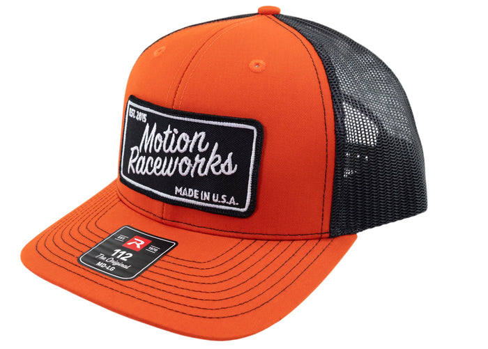 Hugger Orange and Black Motion Raceworks Patch Hat